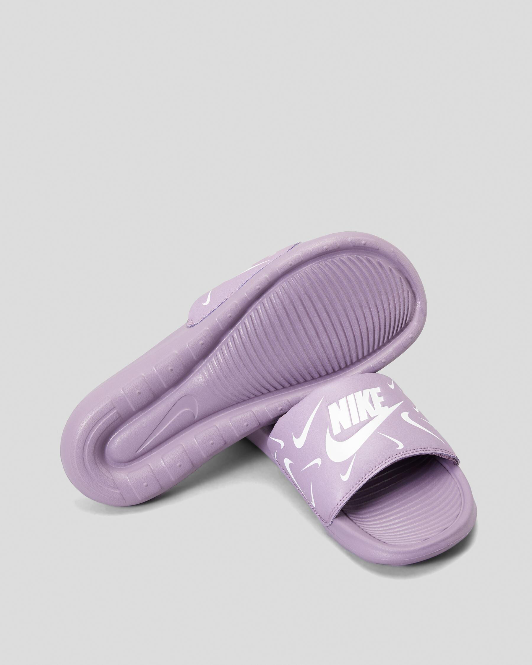 Womens purple best sale nike slides