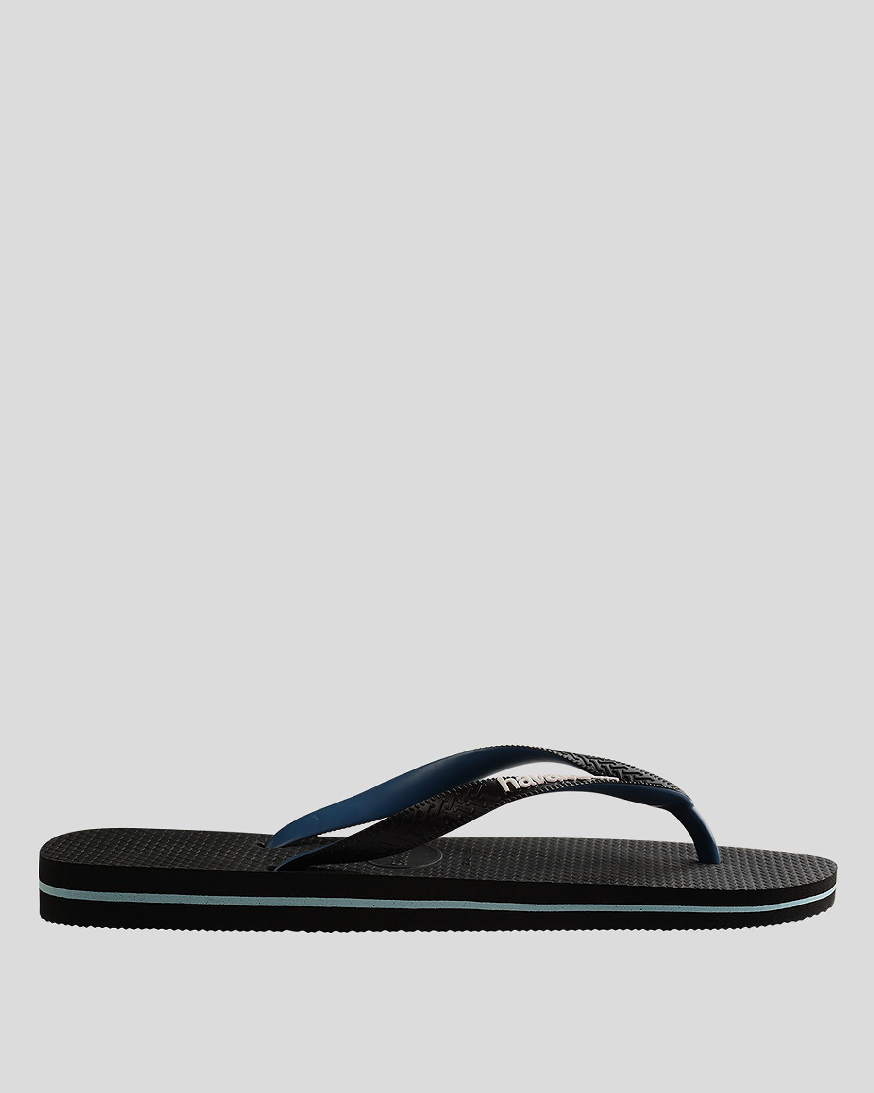Shop Havaianas Top Rubber Logo Mix Thongs In Black/blue - Fast Shipping ...