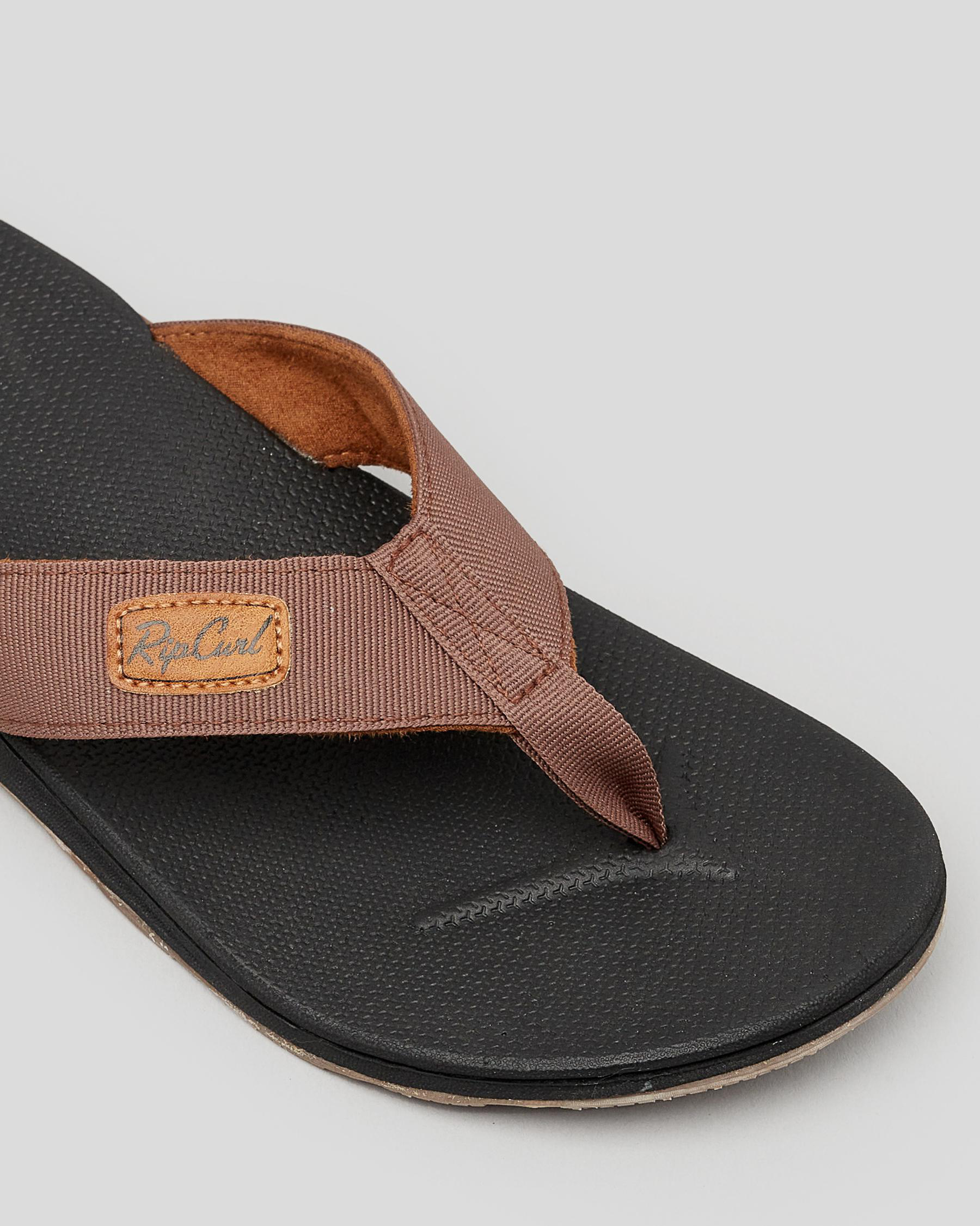 Shop Rip Curl Ranger Thongs In Brown/black - Fast Shipping & Easy ...