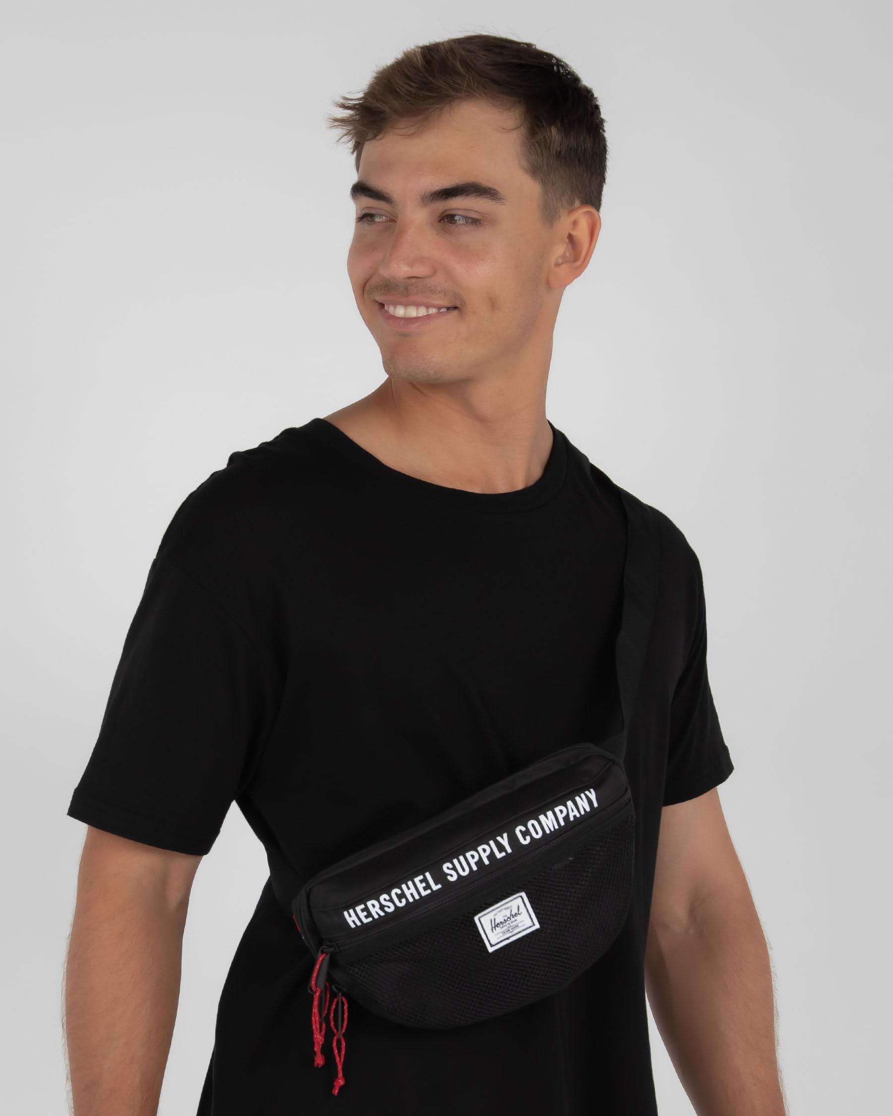 Shop Herschel Nineteen Athletic Waist Bag In Black - Fast Shipping ...