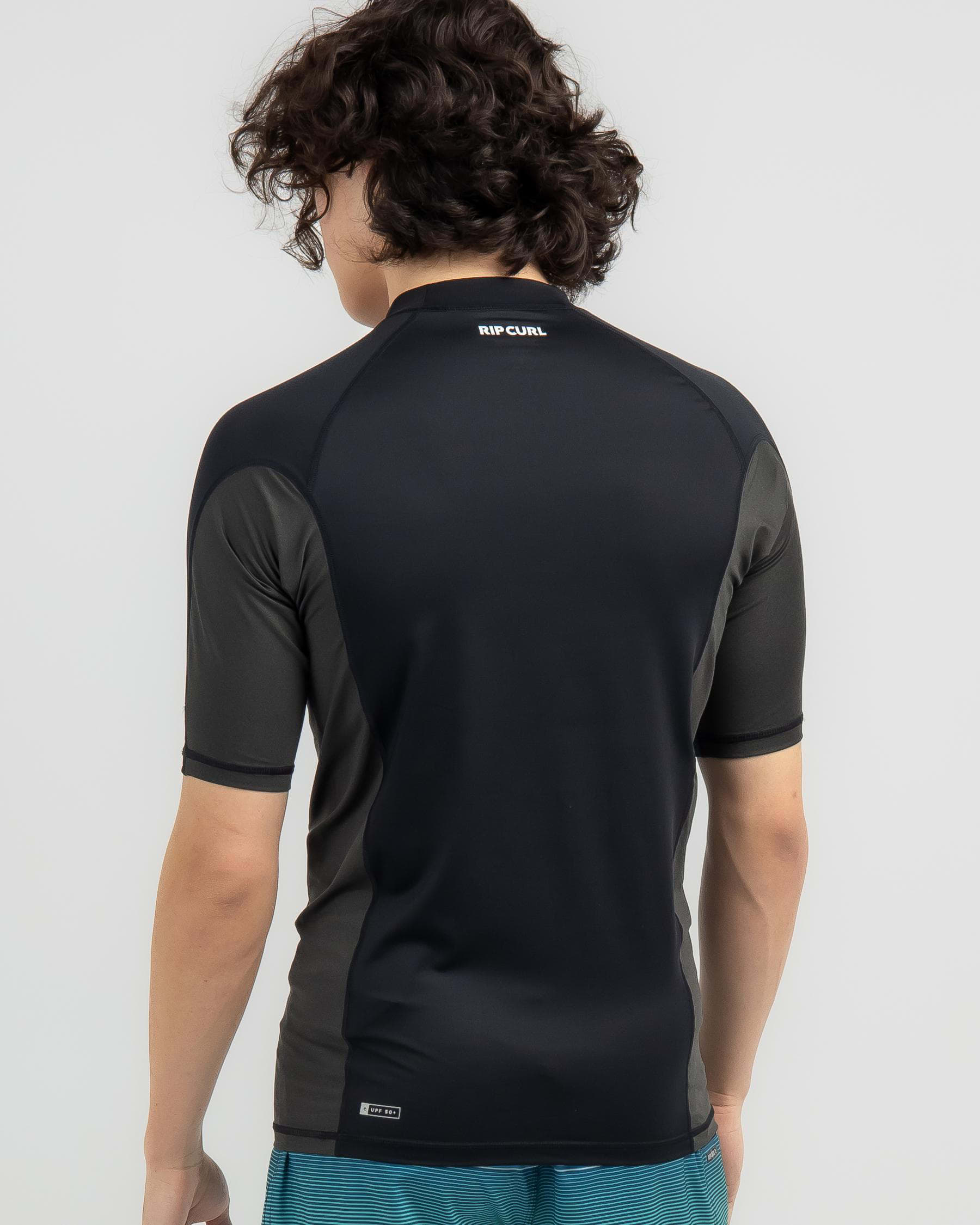 Shop Rip Curl Waves UPF Perf Short Sleeve Rash Vest In Black - Fast ...