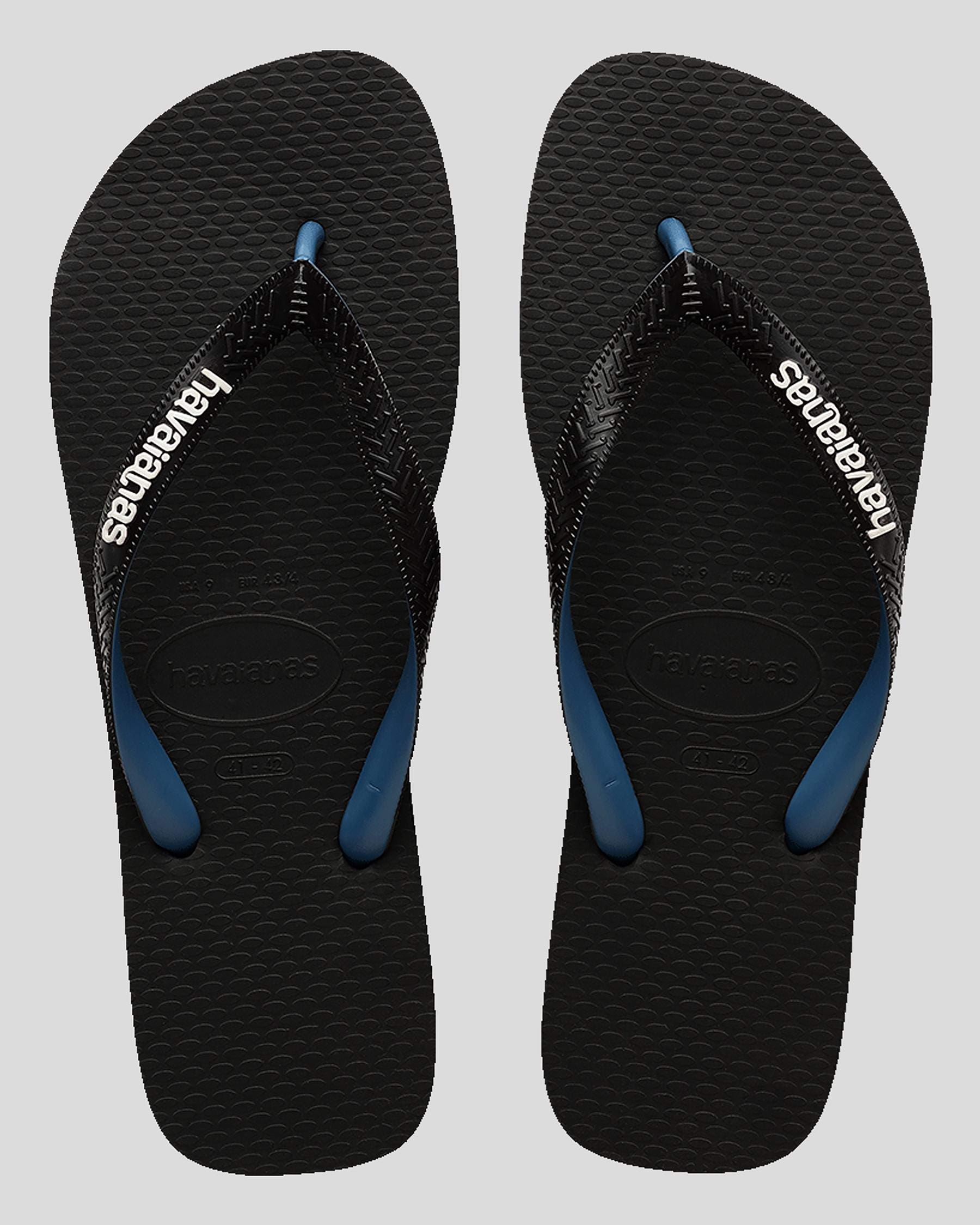 Shop Havaianas Top Rubber Logo Mix Thongs In Black/blue - Fast Shipping ...