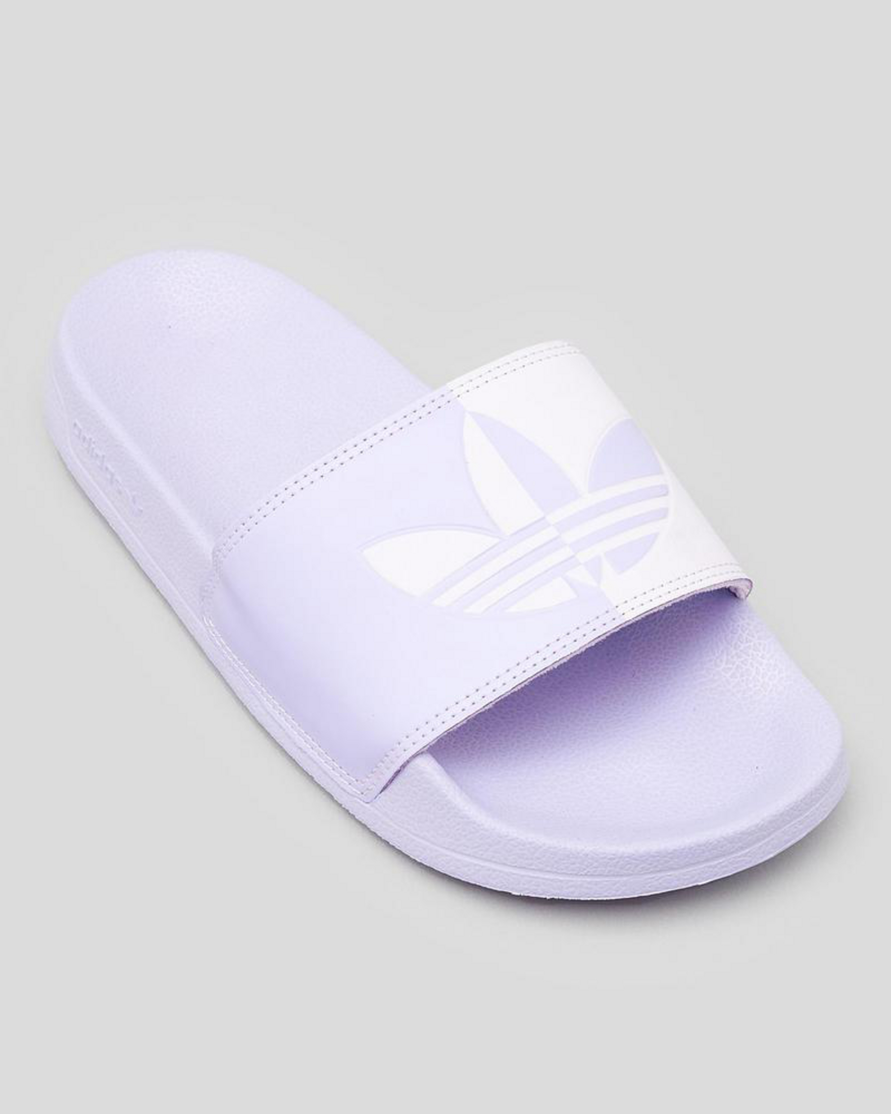 Shop adidas Adilette Slide Sandals In Purple Tint/violet Tone/purple ...
