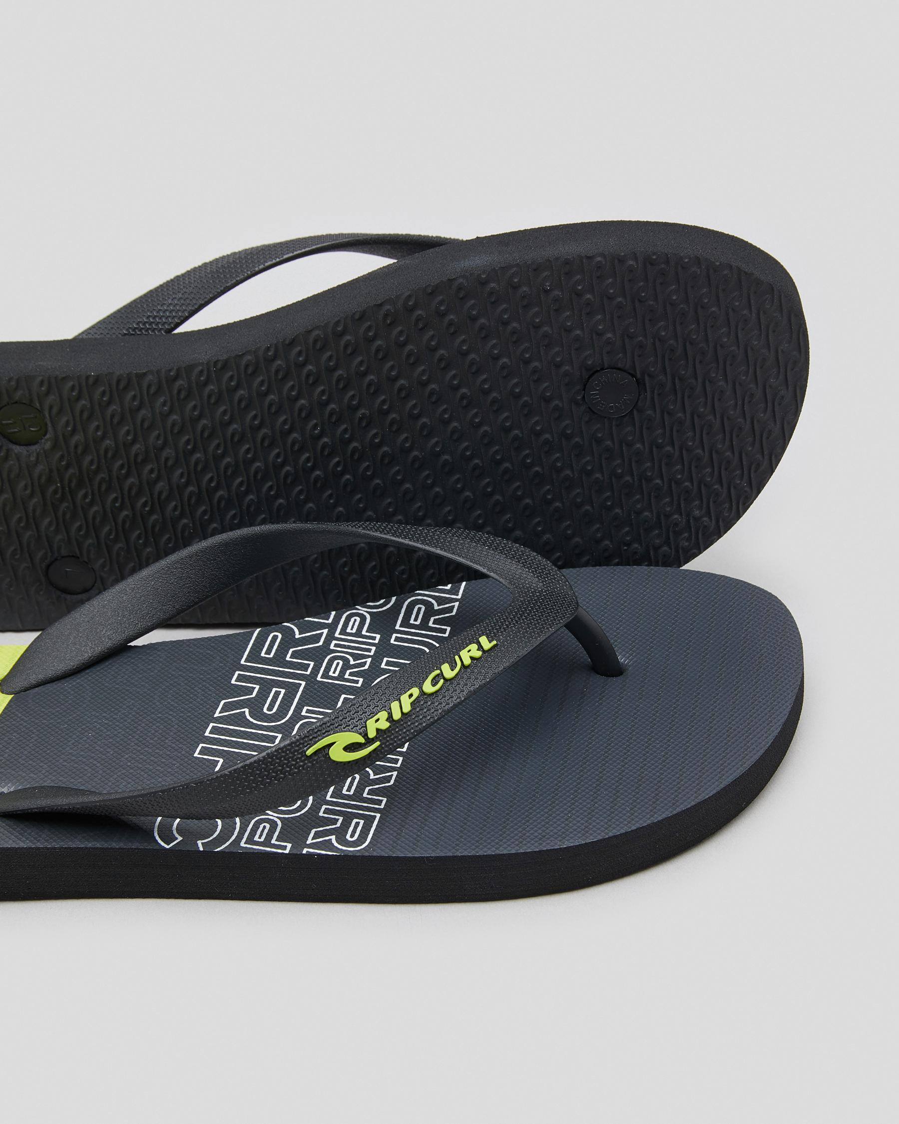 Shop Rip Curl Stacked House Thongs In Black/lime - Fast Shipping & Easy ...