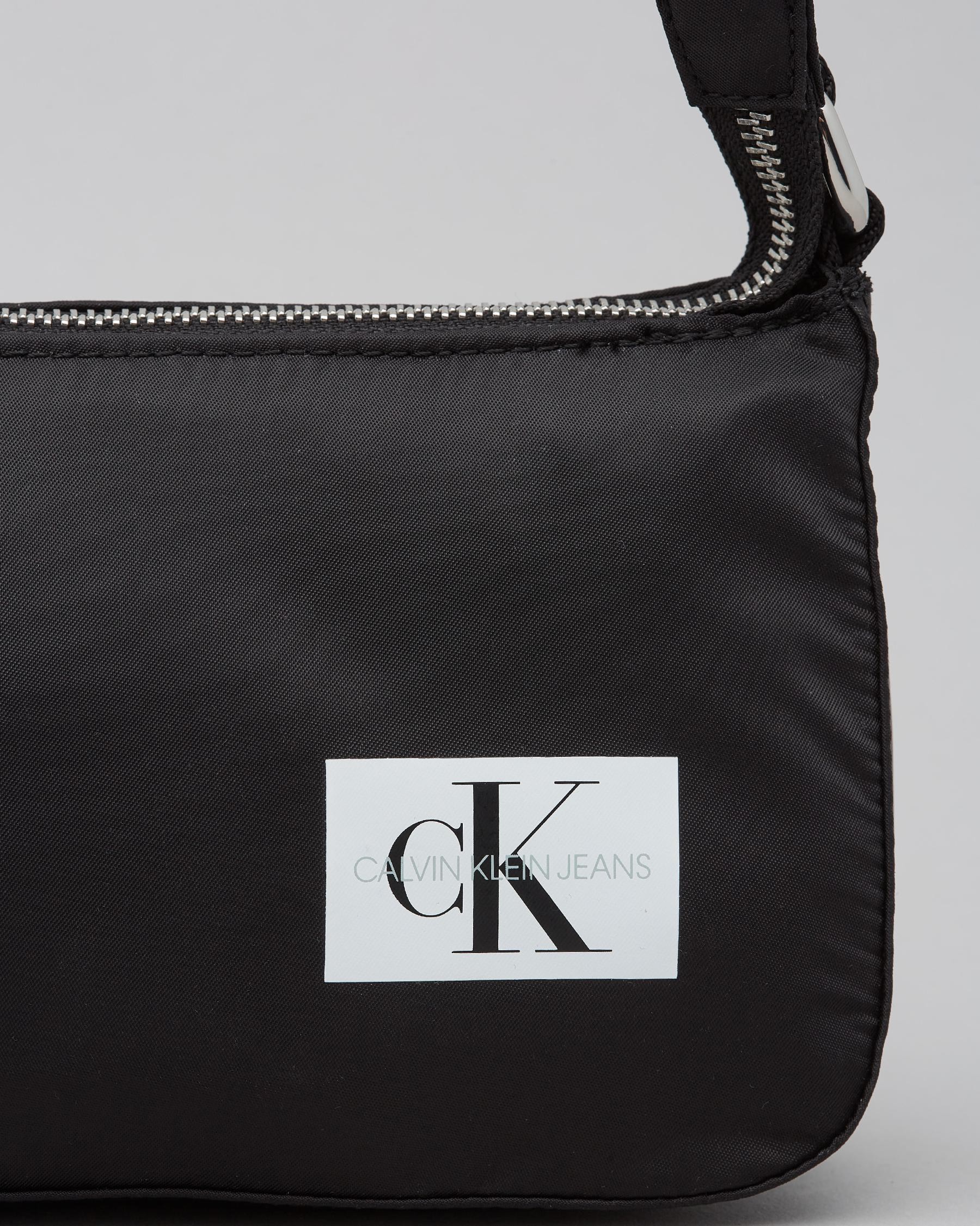 Calvin Klein Logo-Plaque Faux Leather Crossbody Bag - ShopStyle