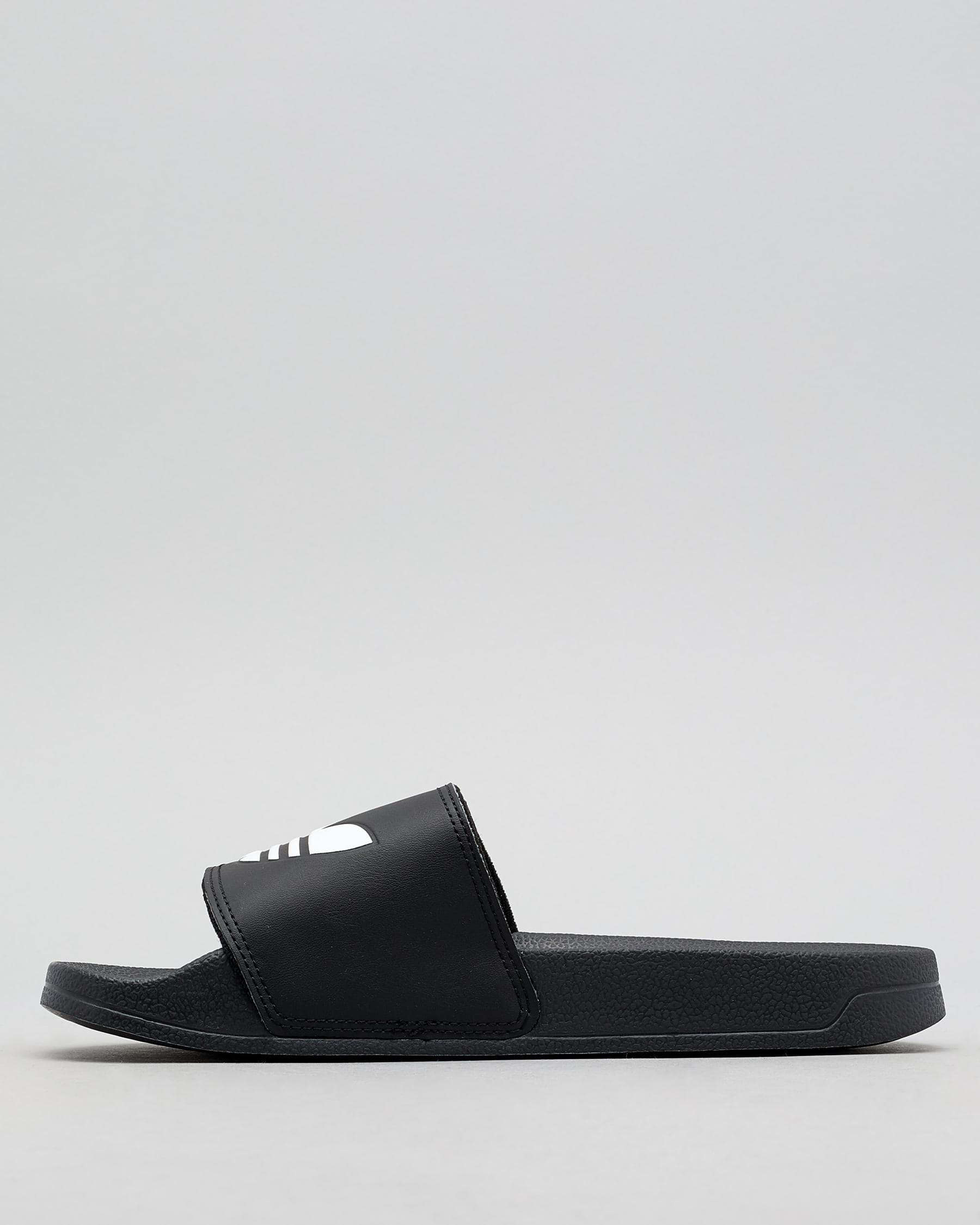 Shop adidas Adilette Lite Slide Sandals In Coreblk/ftwht - Fast ...