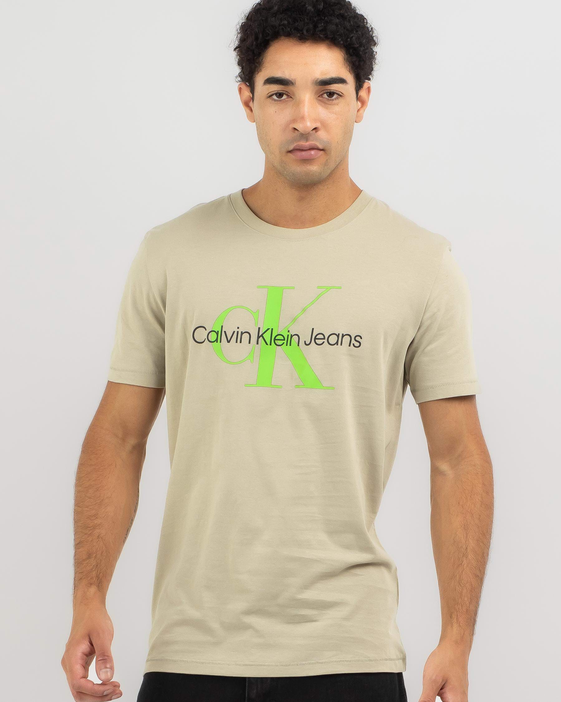 Shop Calvin Klein Seasonal Monologo T-Shirt In Plaza Taupe & Acid Light ...