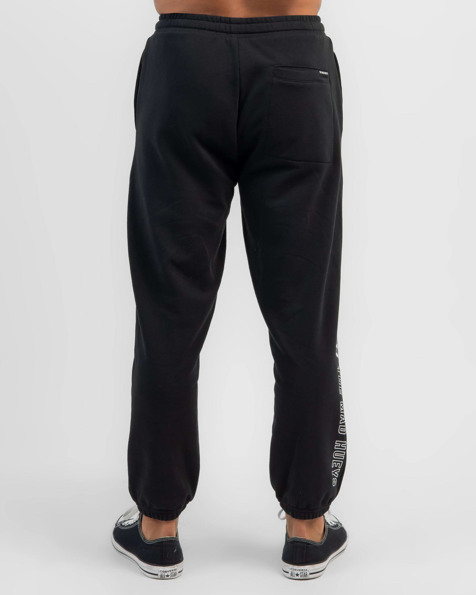 Shop The Mad Hueys Hueys Global Track Pants In Black - Fast Shipping ...