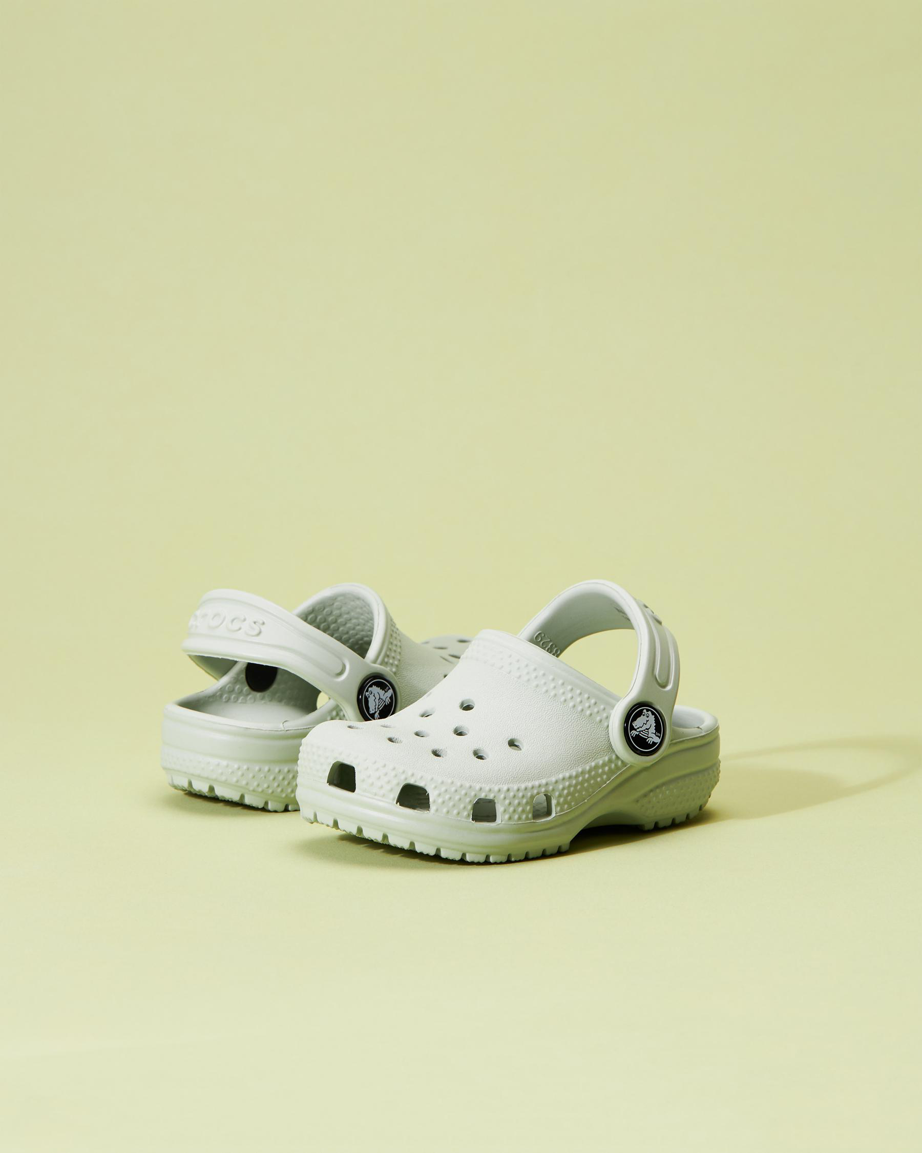 Shop Crocs Toddlers' Classic Clog Sandals In Plaster - Fast Shipping ...