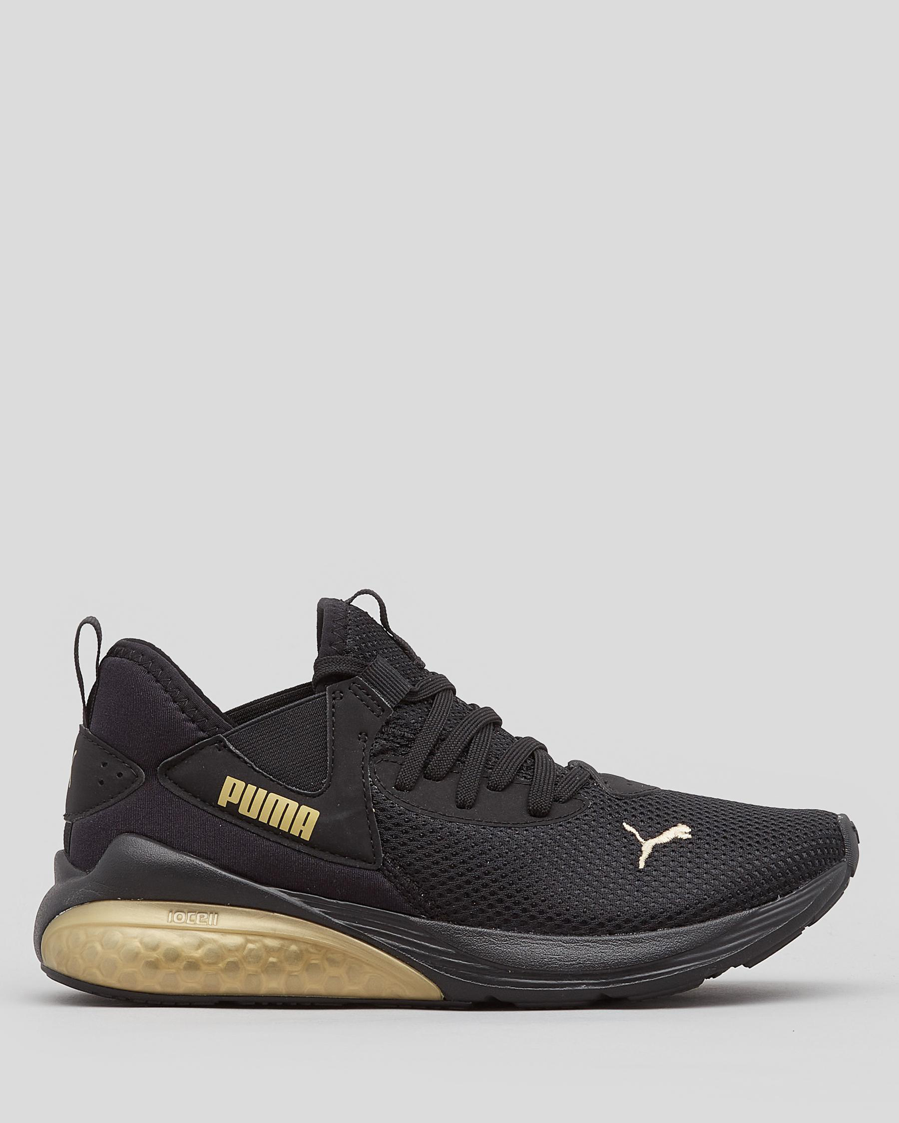 Shop Puma Boys' Cell Vive Shoes In Puma Black-team Gold - Fast Shipping ...