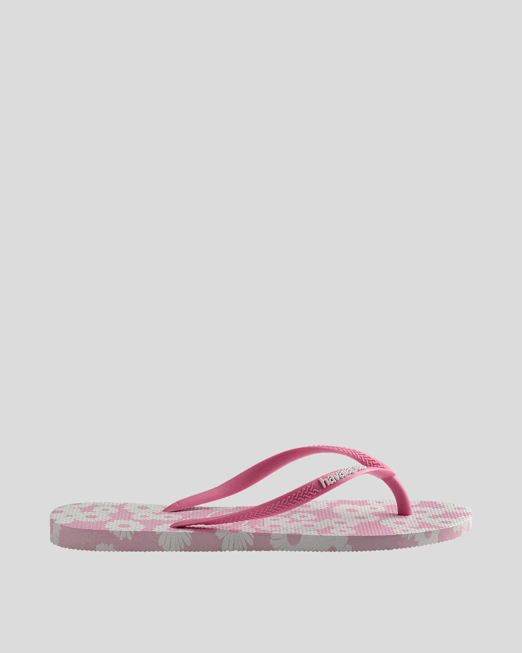 Shop Havaianas Slim Daisy Caitii Thongs In White/rose - Fast Shipping ...