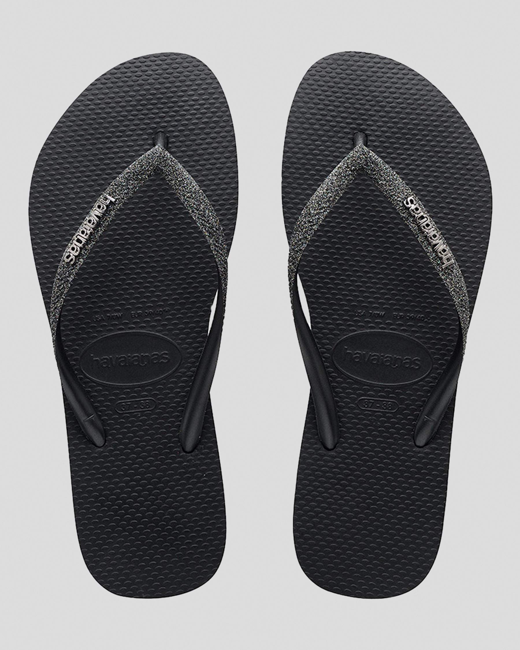 Shop Havaianas Slim Metal Logo Glitter Thongs In Black - Fast Shipping ...
